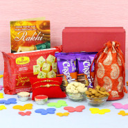 Tasteful Box - Haldiram Soan Papdi, Almond & Cashew in Potli (D), 2 Dairy Milk Crispello, Premium Gift Box (M) with 2 Rakhi and Roli-Chawal 