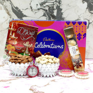 Cheers for Diwali - Almond in Decorative Basket, Cashew in Decorative Basket, Cadbury Celebration, Ferrero Rocher 4 Pcs with 2 Decorative Golden Diyas and Laxmi-Ganesha Coin