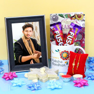 Rakhi Pleasure - Kaju Katli, Personalized World's Best Bro Photo Mug, Photo Frame, 2 Dairy Milk Fuse with 2 Rakhi and Roli-Chawal