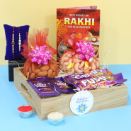 Wonderful Rakhi Tray - Almond in Pouch, Cashew in Pouch, 2 Dairy Milk, Dairy Milk Crispello, Dairy Milk Fuse, Wooden Tray with 2 Rakhi and Roli-Chawal