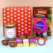 Diwali Hamper of Joy - Almond & Cashew in Jar, Mini Celebrations, Mix Bite with 2 Diyas, Laxmi-Ganesha Coin and Premium Gift Box (P)