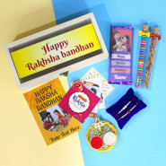 Rakhi Greetings - Almond in Glass Tube, Gems in Glass Tube, Dairy Milk Silk Bar in Personalized Wrapper, Auspicious Ganesha Thali with Pearls, Personalized Card, 4 Rakhi Props, Rakhi Wooden Box with 2 Rakhi and Roli-Chawal
