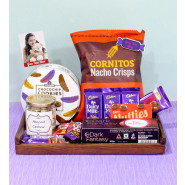 Candid Pleasure - Cornitos Chips, Sapphire Cookies, Almond & Cashew in Personalized Jar, Dark Fantasy Choco Nut Fills, 3 Dairy Milk, Dairy Milk Fruit n Nut, Fuse, Crispello, Kit Kat, Nutties, 3 Personalized Props, Wooden Tray and Card