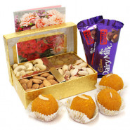 Extraordinary Gift - Assorted Dryfruits, Kanpuri Boondi Laddoo 250 gms, 2 Dairy Milk Fruit N Nut and Card