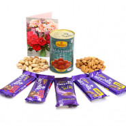 Eminent Surprise - Almond & Pista, Gulab Jamun Tin 500 gms, 2 Dairy Milk Fruit N Nut, 2 Dairy Milk Crackle, 1 Dairy Milk Silk and Card