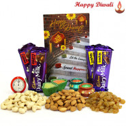 Rich N Dry - Cashew, Raisin, Almond 300 gms in Box, 2 Dairy Milk Fruit & Nut, 2 Dairy Milk Crackle with 4 Diyas and Laxmi-Ganesha Coin