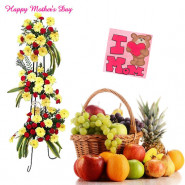 Grand Wishes - 30 Yellow Gerberas + 40 Red Carnations Life Size Arrangement, 5 kg Mix Fruits in Basket and card