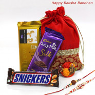 Rakhi Choco Temptations - Temptations, Cadbury Dairy Milk Silk, Snickers in a Potli (D) with 2 Rakhi and Roli-Chawal