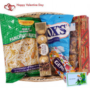 All For Love Basket - Haldiram Namkeen, 1 Gems, Dryfruit Chikki Box, Fox Crystal Clear, Ferrero Rocher 4 Pcs & Valentine Greeting Card