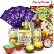 Divine Choco Combo - Ferrero Rocher 16 pcs, Dairy Milk Bars 5 pcs, Ganesh Idol with 2 Diyas and Laxmi-Ganesha Coin