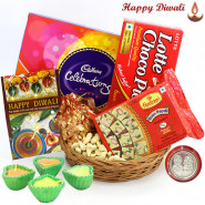 Royal Basket - Cashewnuts in Potli, Cadbury Celebrations, Soan Papdi 250 gms, Chocopie, Basket with 4 Diyas and Laxmi-Ganesha Coin