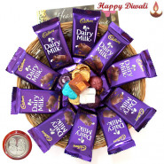 More of Chocs - 10 Dairy Milk, Hand Made Chocolates 100 gms in Basket with Laxmi-Ganesha Coin