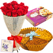 Ideal Feast - 12 Red Roses Bunch, Assorted Dryfruits in Basket 200 gms, Soan Papdi 250 gms & Card