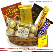 Tempting Treat - Ferrero Rocher 16 Pcs, Temptations, Bourneville, Snicker, Toblerone, Basket with 2 Rakhi and Roli-Chawal
