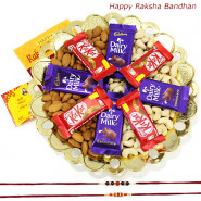 Crunchy Kit - Cashewnuts and Almonds, 4 Dairy Milk, 4 Kitkat with 2 Rakhi and Roli-Chawal