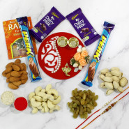 Assorted Choco Delight - Assorted Dryfruits, 2 Perk, 2 Dairy Milk, Fancy Ganesha Thali with Flowers & Perals with 2 Rakhi and Roli-Chawal