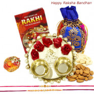 Serene Treat - Almonds Cashews in Potli (D), Elegant Ganesh Thali with Flowers & Pearls with 2 Rakhi and Roli-Chawal