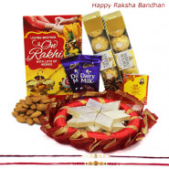 Auspicious Mix - Kaju Katli, Almond 100 gms, 2 Fererro Rocher 4 Pcs, 2 Dairy Milk, Decorative Thali with 2 Rakhi and Roli-Chawal