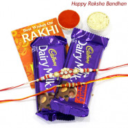 Yummy Delight - 2 Dairy Milk Fruit n Nut with 2 Rakhi and Roli-Chawal
