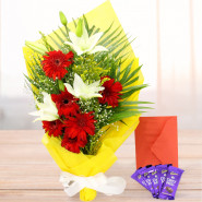 Charming Combo - 6 Red Gerberas, 3 White Lilies in Bunch, 5 Dairy Milk and Card