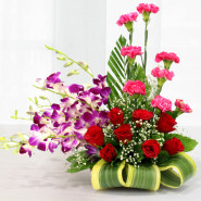 Passionate Gesture - 5 Purple Orchids, 7 Red Roses, 8 Pink Carnations in Basket and Card