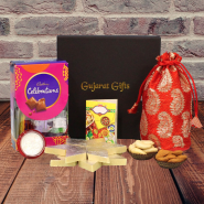 Mesmerizing Present - Kaju Katli, Almond & Cashew in Potli (D), Mini Cadbury Celebrations with Bhaidooj Tikka, Laxmi-Ganesha Coin and Premium Gift Box (B)