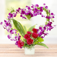 Heart of Love- 6 Purple Orchids, 6 Red Roses in Heart Shape Arrangement in a Vase & Valentine Greeting Card