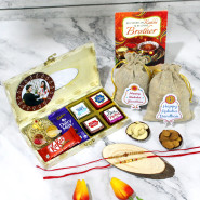 Overwhelming Wishes Personalized Rakhi Hamper - Almonds in Potli, Cashews in Potli, 2 Dairy Milk, Kitkat, 4 Hand Made Chocolates, Delicate Golden Ganesha Thali, 4 Rakhi Props, charming Cream & Golden Gift Box with 2 Rakhi & Tika