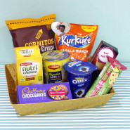 Delicious Delights - Dark Fantasy, Britania Cake, Oreo Mini Pack, Cup Noodles, Cadbury Chocobakes, Nutri Choice Biscuits, Kurkure, Cornitos, 3 Personalized Props, Kraft Paper Tray and Card