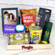 Basketful Of Happiness - Photo Frame, Ferrero Rocher 16 Pcs, Parker Pen, Denver Deo, Cadbury Chocobakes, Cup Noodles, Little Hearts, 2 Personalized Props, Wooden Tray and Card