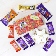 Bountiful Wishes - Kaju Katli, Dairy Milk Fruit & Nut, Dairy Milk Crispello, 4 Dairy Milk, 2 Kitkat, Five Star, 2 Personalized Props, Decorative Handcrafted Red Box with Clasp and Card