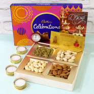 Dryfruits Celebration - Assorted Dryfruits 200 gms, Cadbury Celebrations 121 gms, 24 Carat Gold Plated Dhan Laxmi Varsha Note with 4 Golden Diyas and Laxmi-Ganesha Coin