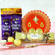 Ferrero with Thali - Ferrero Rocher 4 Pcs, Designer Ganesh Thali, 2 Dairy Milk with 2 Rakhi and Roli-Chawal