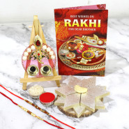 Kaju Katli Decorative Thali - Kaju Katli, Designer Ganesha Thali with Pearls & Diamond with 2 Rakhi and Roli-Chawal