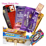 All of Chocos - Ferrero Rocher 4 pcs, 1 Temptations 72 gms, 1 Bournville 33 gms, 1 Perk 17 gms, 1 5 Star 22 gms, Cadbury Dairy Milk 38 gms, Cadbury Dairy Milk Fruit n Nut 42 gms, Cadbury Dairy Milk Crackle 42 gms, 1 Gems and card