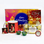 Happy Diwali Personalised Photo Mug, Photo Key Chain, Ferrero Rocher 16 Pcs, Cadbury Celebrations 118 gms with 2 Diyas and Laxmi-Ganesha Coin
