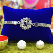 Om Floral Diamond Silver Rakhi