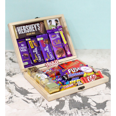Fascinating Surprise - Hershey's Chocolate Bar, Ferreo Rocher 4 Pcs, Dairy Milk Silk, Fruit n Nut, Crackle, Fuse, Crispello, Dairy Milk, Snickers, Nutties, Kit Kat, Five Star, Perk, Munch, Gems, 3 Personalized Props, Personalized Wooden Box
