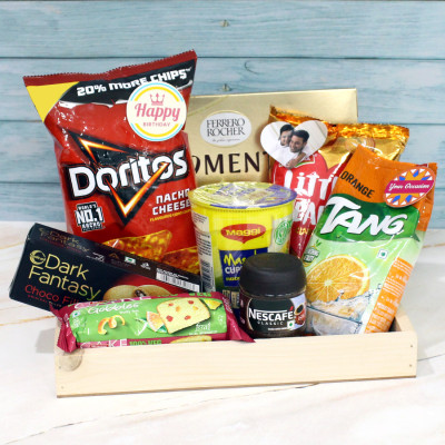 Joyful Hampers - Cup Noodles, Nescafe Classic Coffee, Doritos, Dark Fantasy, Ferrero Rocher Moment, Little Heart , Tang, Britania Cake, 3 Personalized Props, Wooden Tray